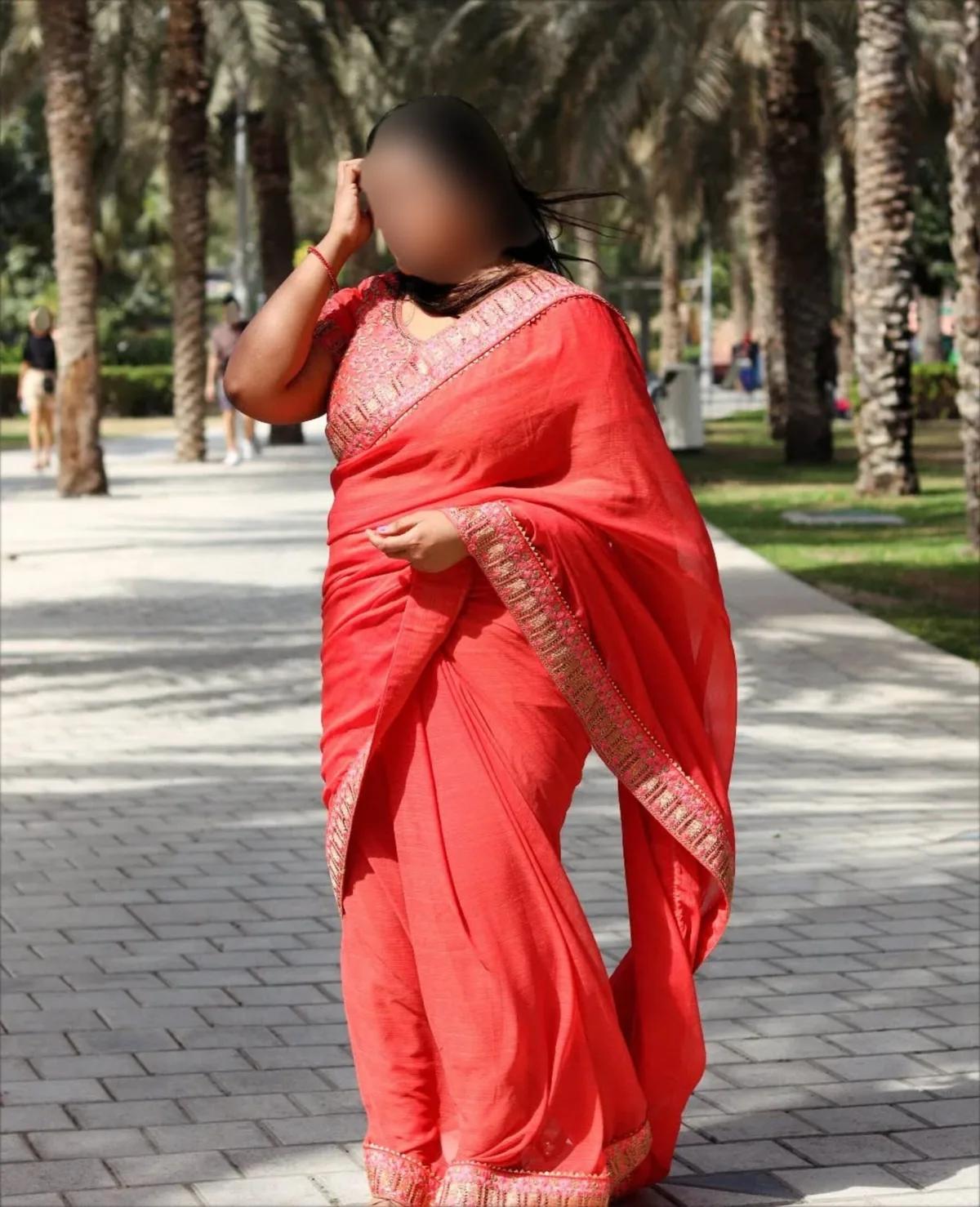 Pranavi travel portrait in a red saree